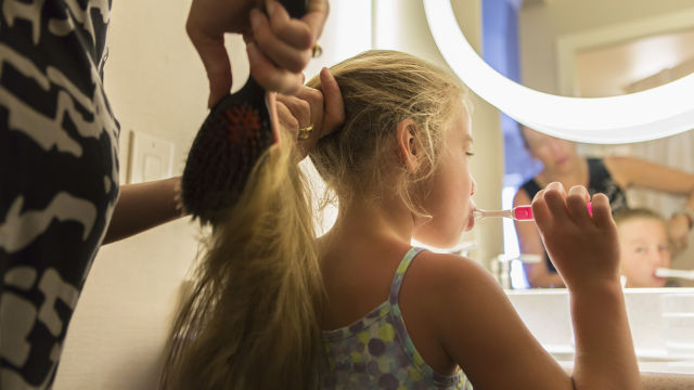 Girl brushing her teeth