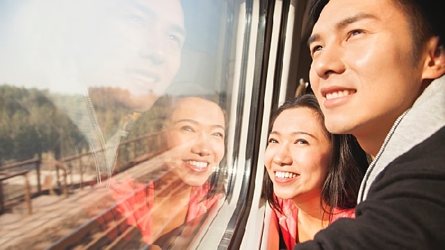A couple looking through a window
