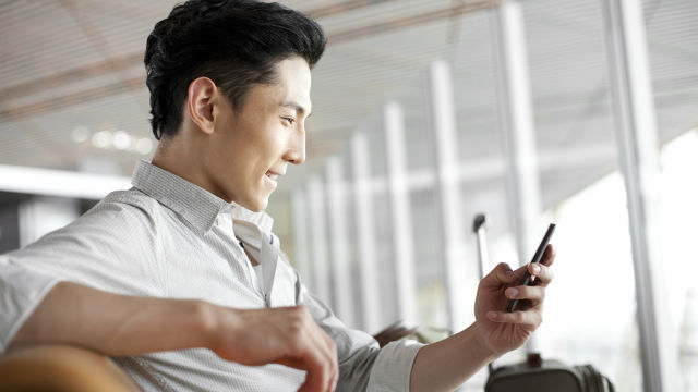 Men using the cell phone