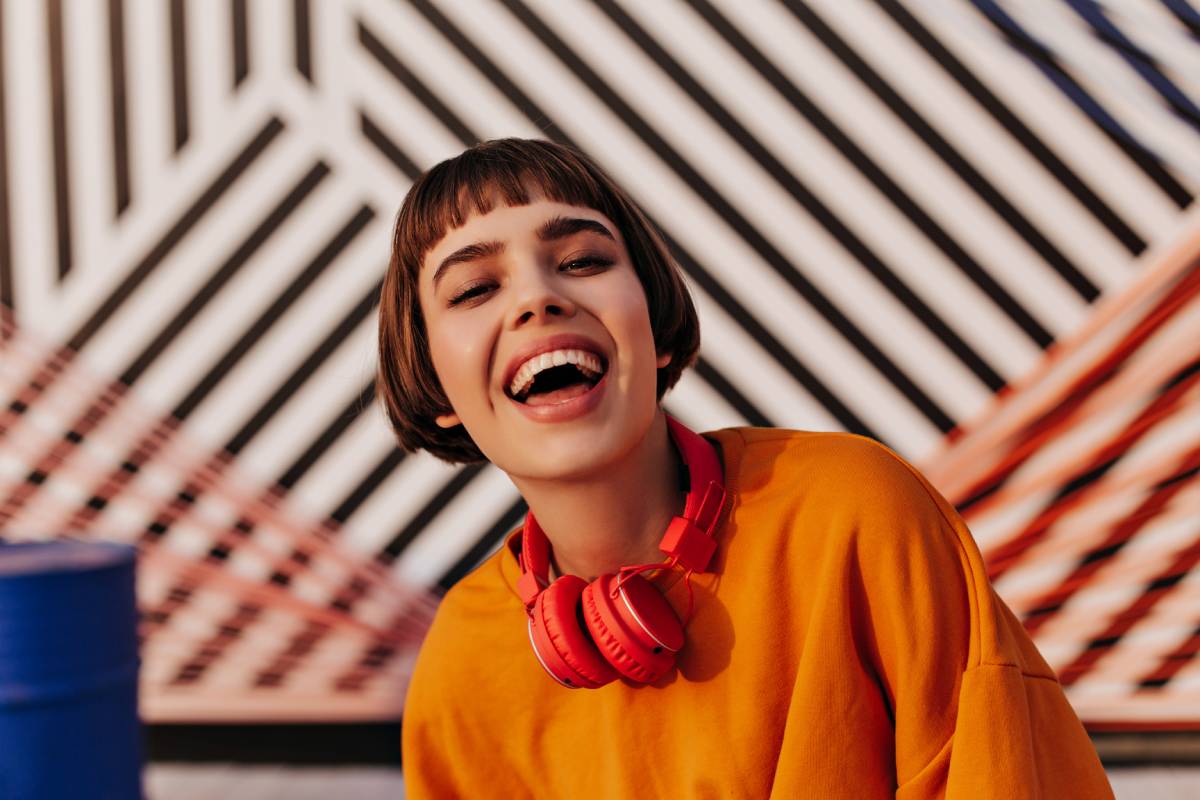 man smiling next to woman man smiling next to woman