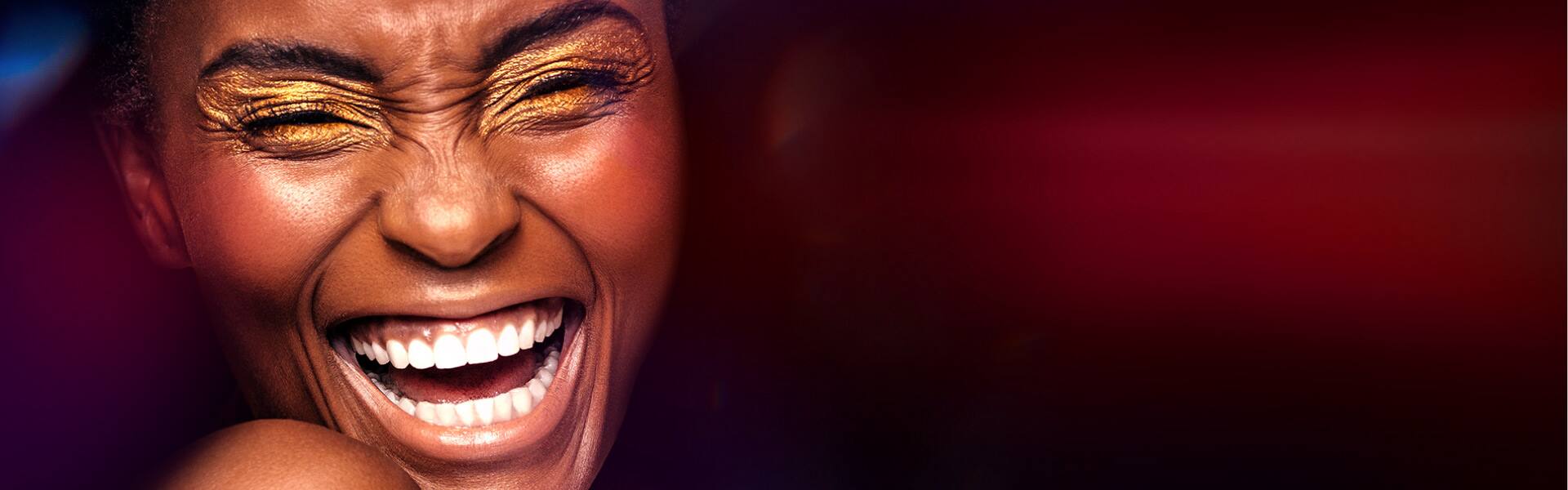 Woman smiling with her white teeth