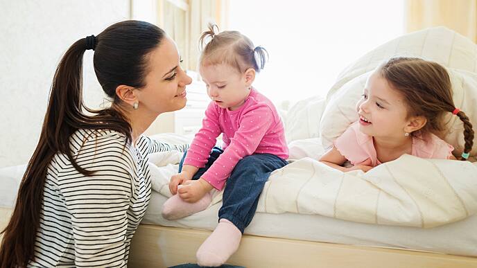 Parent Helping Child with Teething Rash