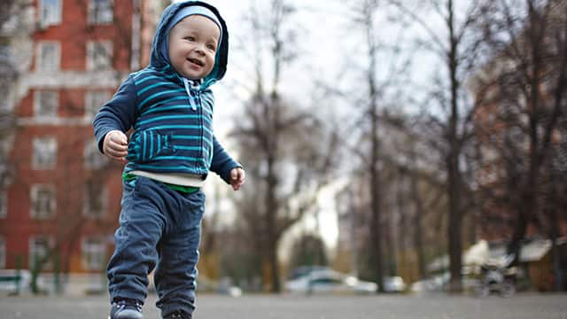 young child playing in the park