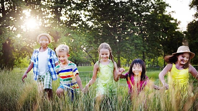 Group of Children Smiling with Healthy Teeth