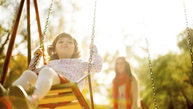 Girl Playing in Park