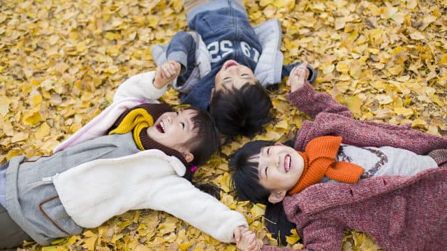 Children laughing in a ground