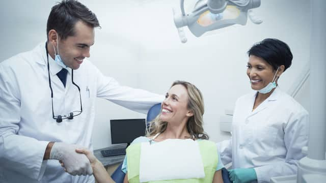 patient with two dentists