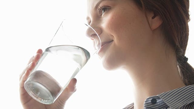 woman drinking water