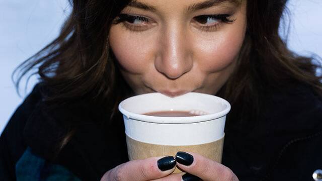 woman drinking coffee