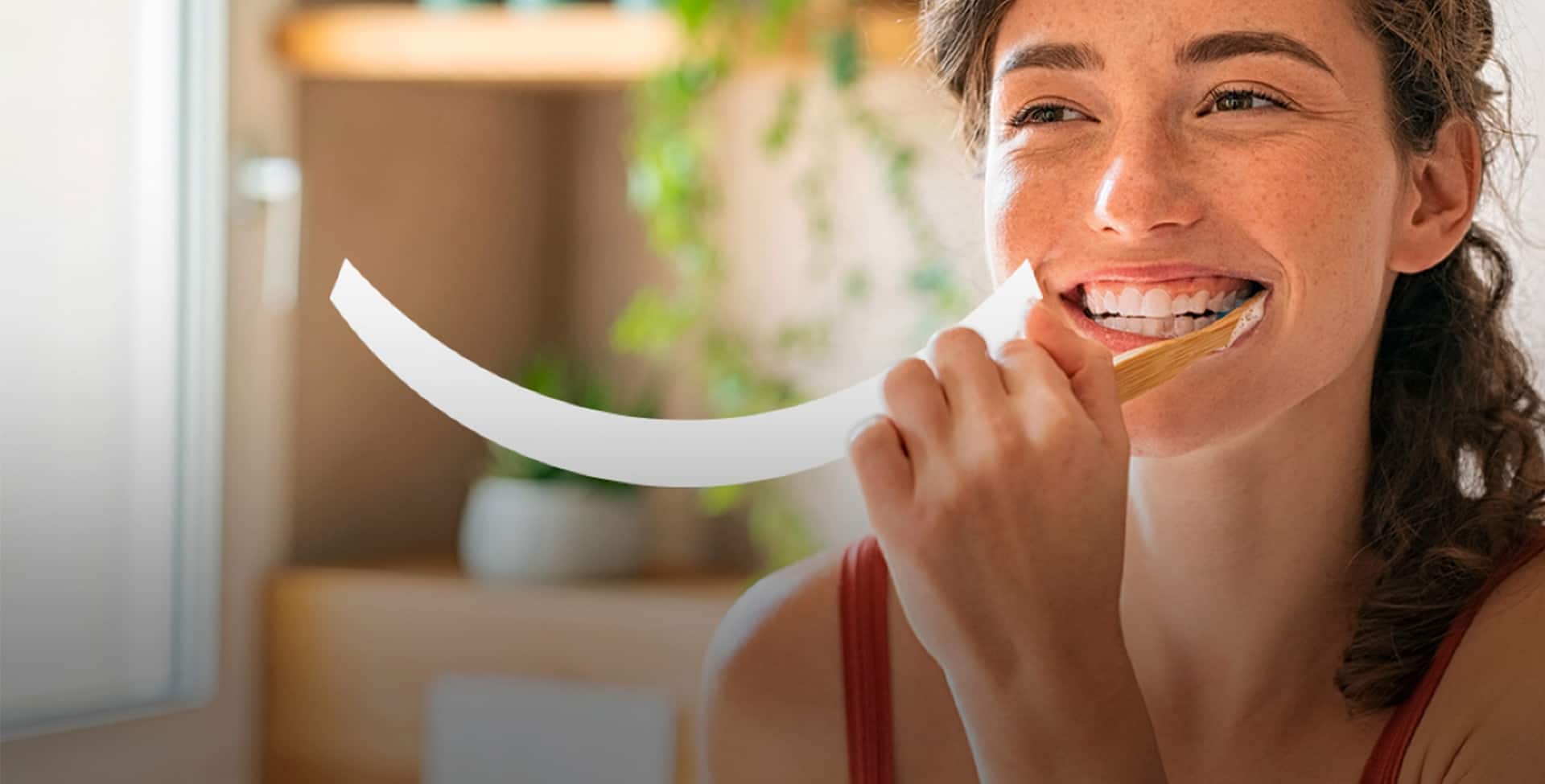 Kid smiling while she eats her breakfast